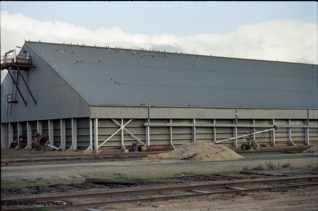 136-21
Deniliquin horizontal Victorian Oats Pool shed - grain bunker, part view.
