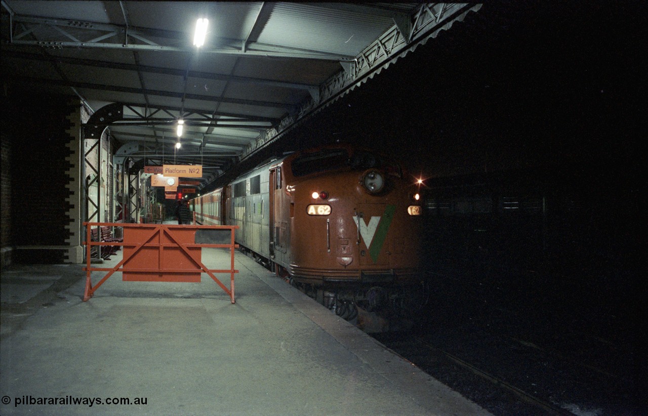 136-33
Seymour station platform view V/Line broad gauge A class A 62 Clyde Engineering EMD model AAT22C-2R serial 84-1183 rebuilt from B 62 Clyde Engineering EMD model ML2 serial ML2-3 waits to depart Seymour with the Sunday evening down pass to Cobram train 8345.
Keywords: A-class;A62;Clyde-Engineering-Rosewater-SA;EMD;AAT22C-2R;84-1183;rebuild;bulldog;