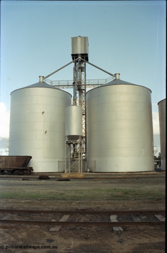 136-17
Deniliquin Ascom style silo complex, track view, loading spout and surge silo.
