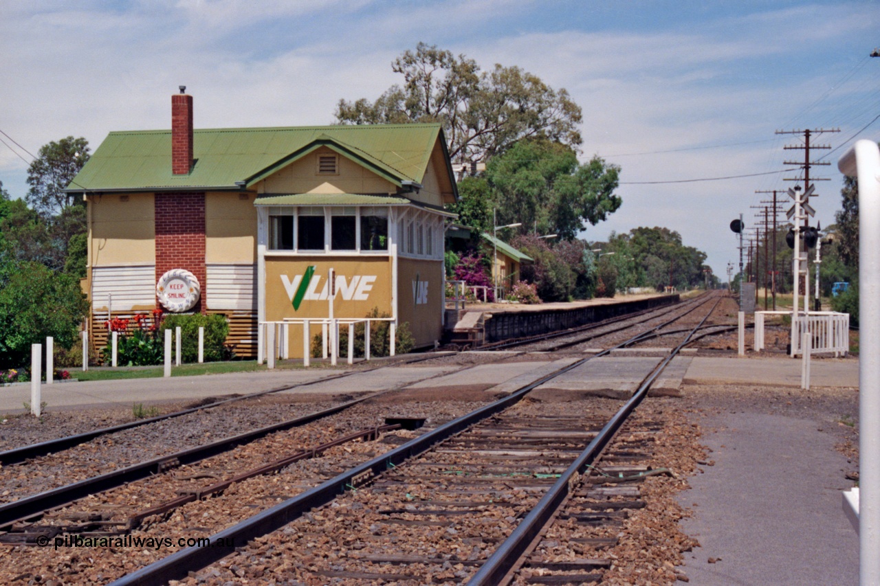 137-1-14
Violet Town station overview, looking south across Cowslip Street crossing, station building, signal box and platform, points to No. 3 Rd at road crossing.
