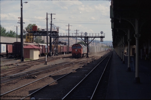 137-2-06
Albury station yard overview, standard gauge V/Line G class G 518 Clyde Engineering EMD model JT26C-2SS serial 85-1231 raises the dust as it cuts off the down goods train, the unit will head to loco, to the left of G 518 is the broad gauge goods loop.
Keywords: G-class;G518;Clyde-Engineering-Rosewater-SA;EMD;JT26C-2SS;85-1231;