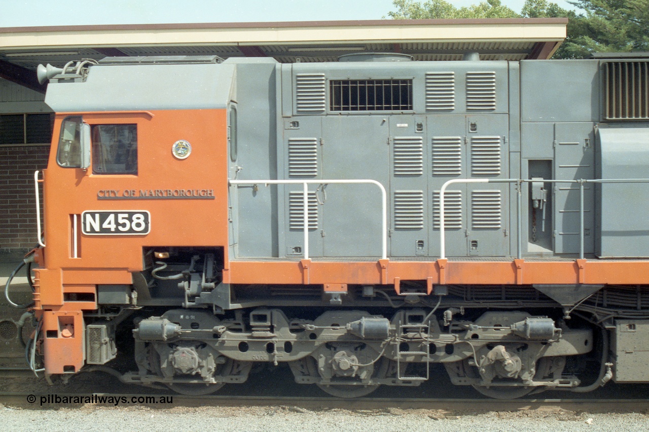 138-15
Bendigo station, cab side view, number board and name plate of V/Line broad gauge N class Loco N 458 'City of Maryborough' Clyde Engineering EMD model JT22HC-2 serial 85-1226.
Keywords: N-class;N458;Clyde-Engineering-Somerton-Victoria;EMD;JT22HC-2;85-1226;