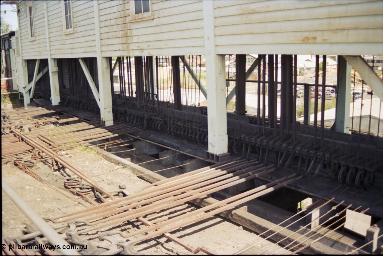 140-1-10
Ballarat A signal box, view of point rodding and signal wires underneath the box.
