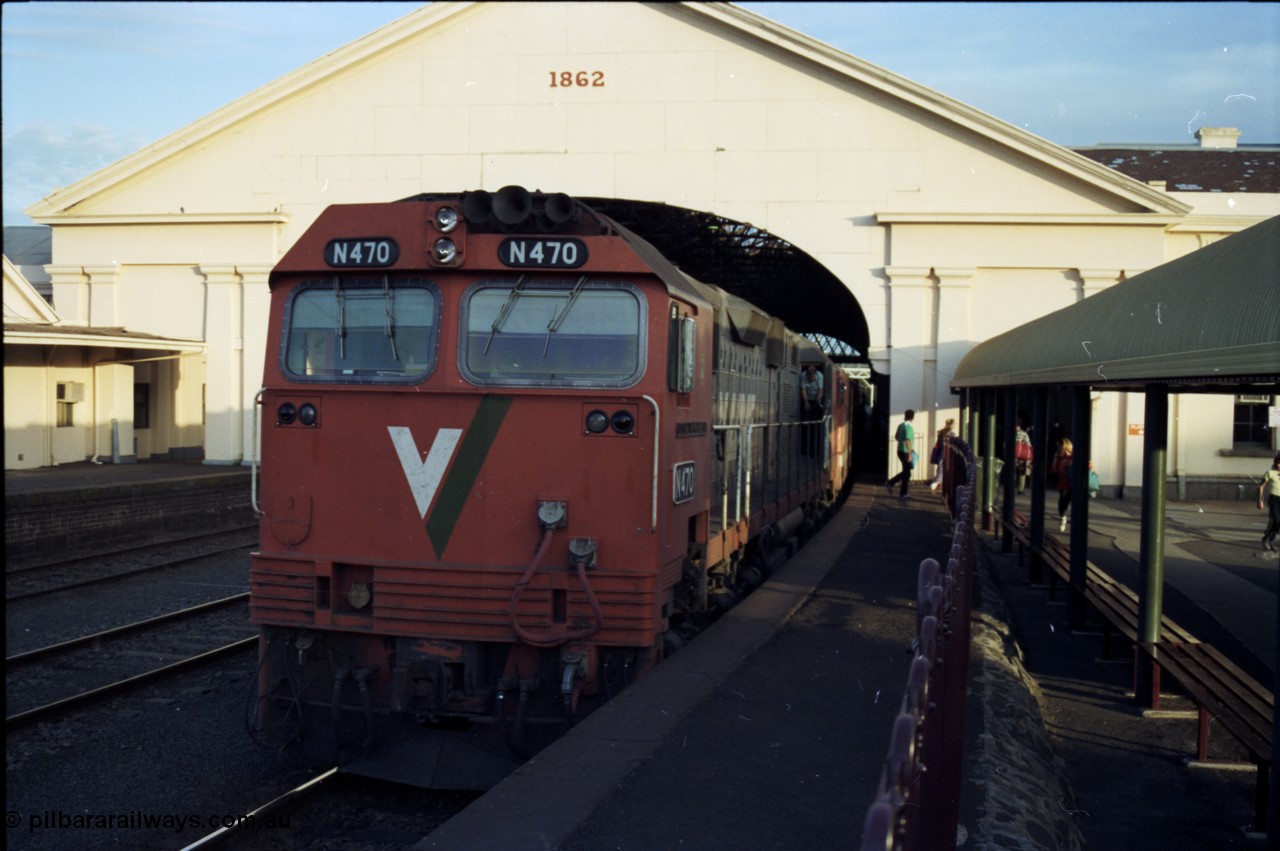 140-2-11
Ballarat station, V/Line broad gauge N class N 470 'City of Wangaratta' Clyde Engineering EMD model JT22HC-2 serial 86-1199 has arrived at Ballarat Station with a down passenger train.
Keywords: N-class;N470;Clyde-Engineering-Somerton-Victoria;EMD;JT22HC-2;86-1199;