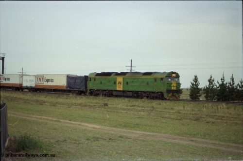 140-2-17
Deer Park West, Australian National broad gauge BL class BL 29 Clyde Engineering EMD model JT26C-2SS serial 83-1013 in AN livery works an Adelaide bound down goods train.
Keywords: BL-class;BL29;Clyde-Engineering-Rosewater-SA;EMD;JT26C-2SS;83-1013;