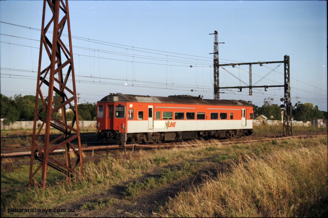 141-1-13
Sunshine, broad gauge V/Line Tulloch Ltd of NSW built DRC class diesel car heads a down Bacchus Marsh passenger service.
Keywords: DRC-class;Tulloch-Ltd-NSW;