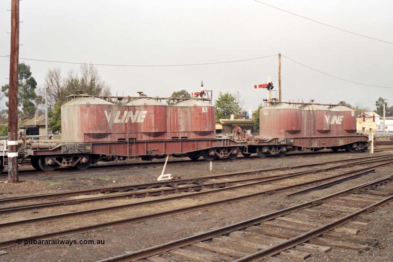 142-1-34
Benalla yard, stabled 9303 Wodonga goods, broad gauge V/Line VPCX class bogie pneumatic discharge cement waggons VPCX 23 and VPCX 99, up home semaphore signal post 7 and 7B are behind them. VPCX 23 built new in July 1964 as JX type at Newport Workshops and recoded to VPCX in July 1980. VPCX 99 was built in December 1976 at Newport Workshops as a JX type, recoded in 1981.
Keywords: VPCX-type;VPCX23;VPCX99;Victorian-Railways-Newport-WS;JX-type;