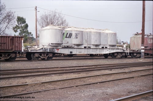 142-1-33
Benalla yard, stabled 9303 Wodonga goods, broad gauge V/Line VPLX type bogie pneumatic discharge lime (ex-flour) waggon VPLX 6, converted from VPFX type in December 1989, originally built February 1970 at Newport Workshops as an FX type bogie bulk flour hopper, recoded to VPFX in September 1979.
Keywords: VPLX-type;VPLX6;Victorian-Railways-Newport-WS;FX-type;