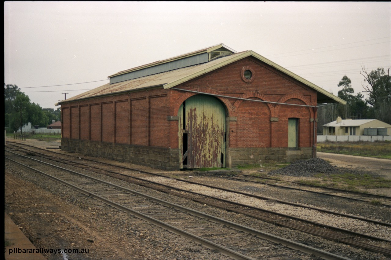 142-2-10
Barnawartha, yard view, goods shed from north end looking south, No.1 or platform Rd removed, point rodding.
