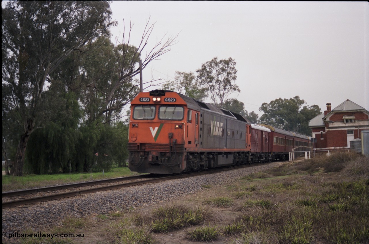 142-2-11
Barnawartha, standard gauge V/Line G class G 523 Clyde Engineering EMD model JT26C-2SS serial 86-1236 leads a down special 'Phantom of the Opera' passenger train past the rear of the broad gauge station building.
Keywords: G-class;G522;Clyde-Engineering-Rosewater-SA;EMD;JT26C-2SS;86-1235;