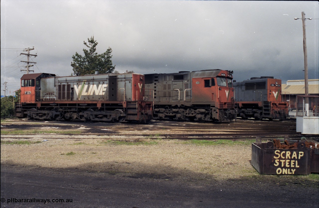 142-2-15
Wodonga loco depot turntable roads, stabled V/Line broad gauge locos share the table on a rainy Sunday arvo, Y class Y 137 Clyde Engineering EMD model G6B serial 65-403, N class N 474 'City of Traralgon' Clyde Engineering EMD model JT22HC-2 serial 87-1203 and X class X 53 Clyde Engineering EMD model G26C serial 75-800.
Keywords: Y-class;Y137;Clyde-Engineering-Granville-NSW;EMD;G6B;65-403;