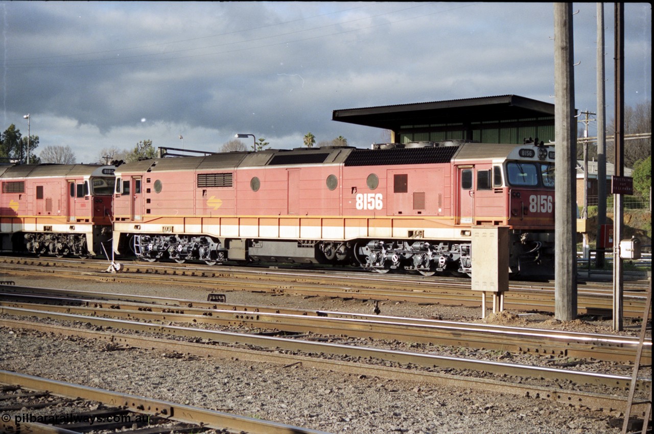 142-3-05
Albury loco depot fuel point sees standard gauge NSWSRA 81 class locos 8156 Clyde Engineering EMD model JT26C-2SS serial 84-1075 and 8180 serial 85-1099 in the candy livery.
Keywords: 81-class;8156;Clyde-Engineering-Kelso-NSW;EMD;JT26C-2SS;84-1075;