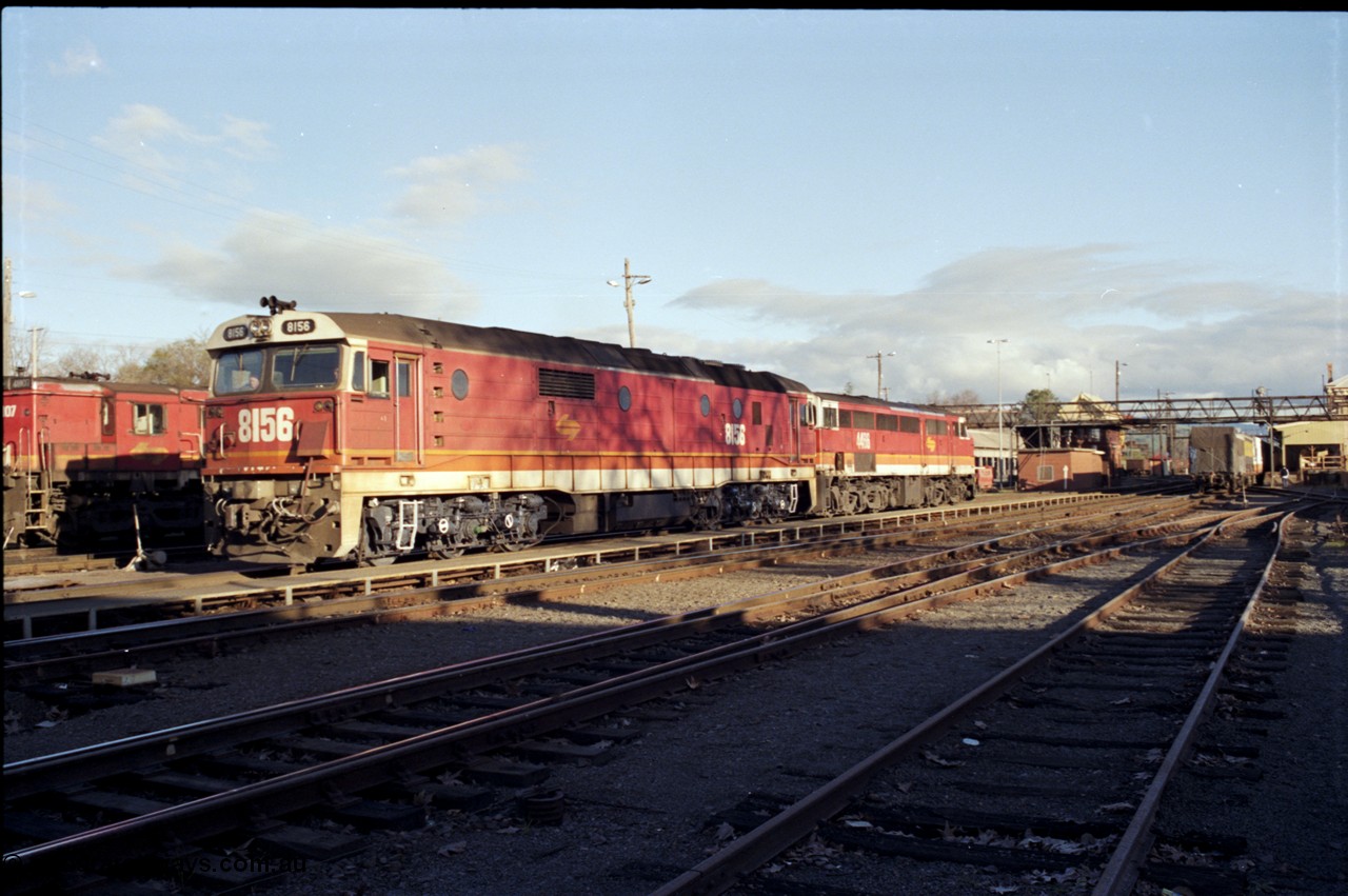 142-3-11
Albury station yard, standard gauge NSWSRA candy liveried pair of 81 class 8156 Clyde Engineering EMD model JT26C-2SS serial 84-1075 and 44 class 4466 AE Goodwin ALCo model DL500B serial G3421-06 depart the yard bound for the paper mill siding just north of Albury.
Keywords: 81-class;8156;Clyde-Engineering-Kelso-NSW;EMD;JT26C-2SS;84-1075;