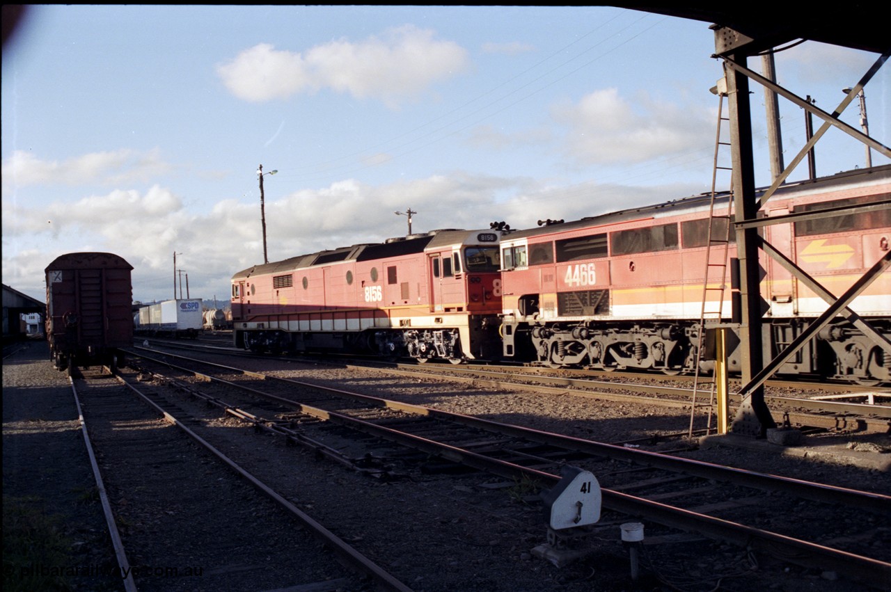 142-3-12
Albury station yard, standard gauge NSWSRA candy liveried pair of 81 class 8156 Clyde Engineering EMD model JT26C-2SS serial 84-1075 and 44 class 4466 AE Goodwin ALCo model DL500B serial G3421-06 depart the yard bound for the paper mill siding just north of Albury, ground signal 41, point rodding, trailing shot.
Keywords: 44-class;4466;AE-Goodwin;ALCo;DL500B;G3421-6;