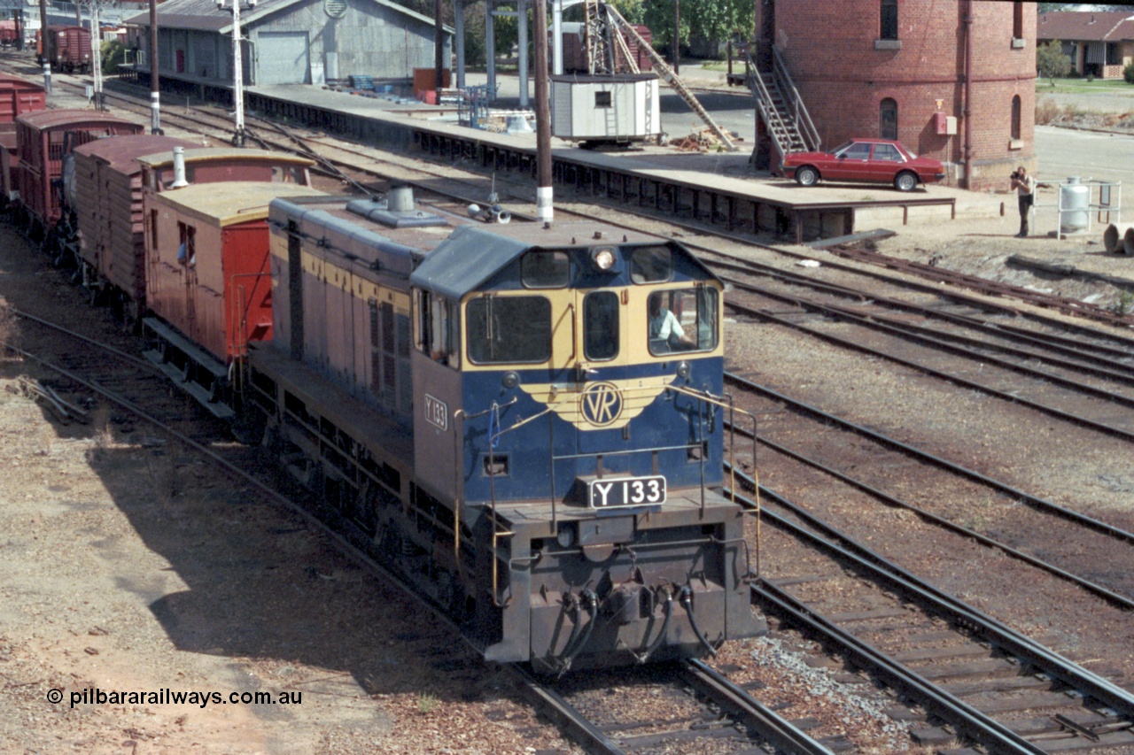 143-07
Wangaratta, broad gauge VR liveried Y class Y 133 Clyde Engineering EMD model G6B serial 65-399 departs with the down special 'Stringybark Express' mixed train to Springhurst and Wahgunyah.
Keywords: Y-class;Y133;Clyde-Engineering-Granville-NSW;EMD;G6B;65-399;