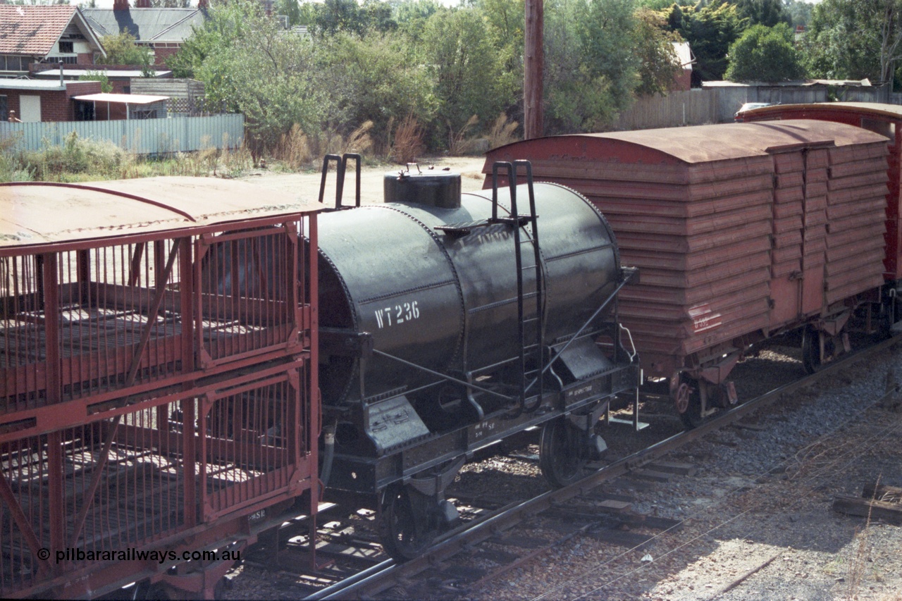 143-10
Wangaratta, down Wahgunyah Special 'Stringybark Express' mixed train with WT class four wheel water tank waggon WT 236, L class four wheel sheep waggon and U class four wheel louvre van. WT 236 was converted from Newport Workshops built OT 39 by Victorian Railways Bendigo Workshops in November 1962. OT 39 was originally built in April 1926.
Keywords: WT-type;WT236;Victorian-Railways-Newport-WS;OT-type;OT39;