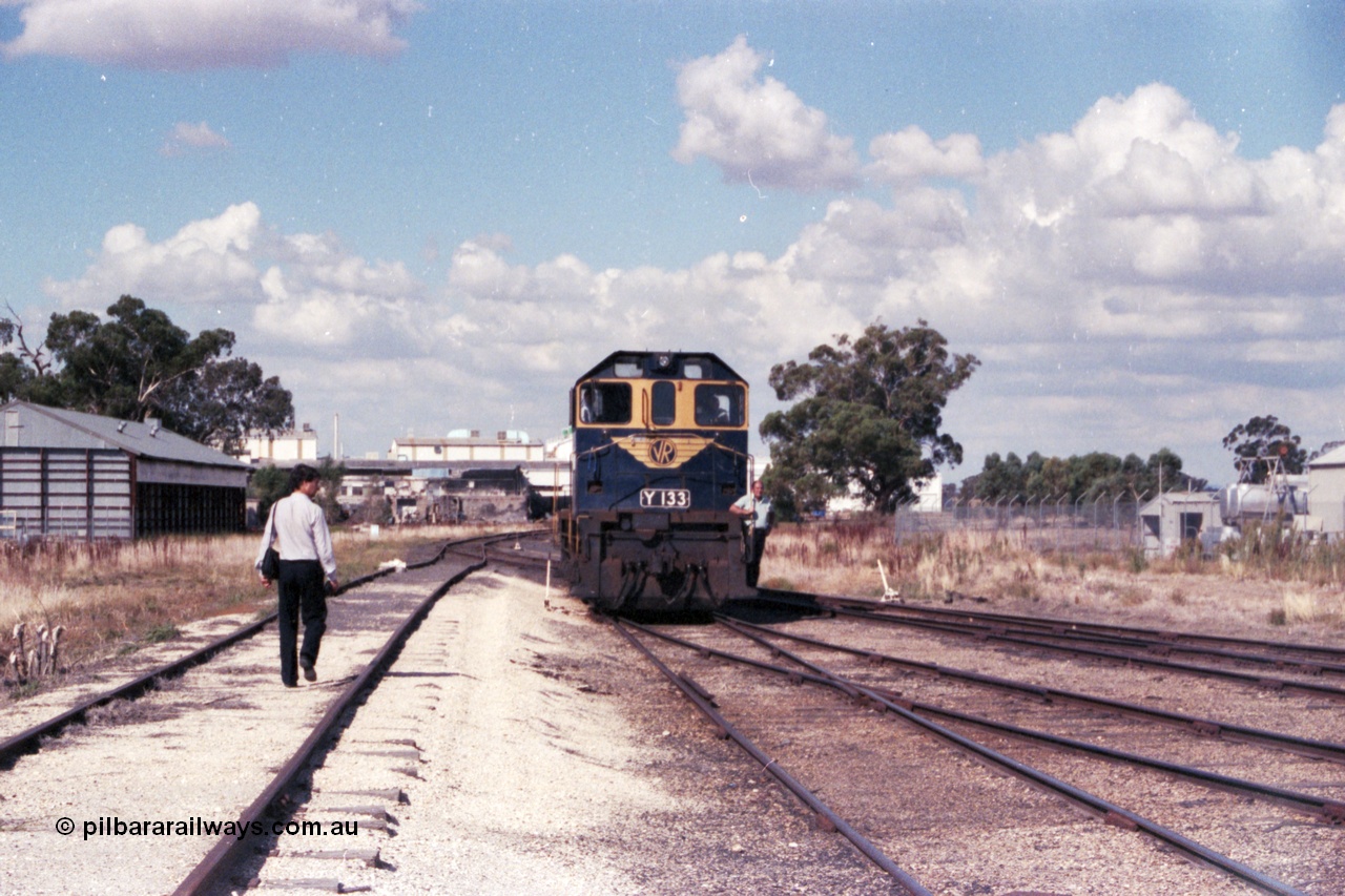 143-27
Wahgunyah, broad gauge VR liveried Y class Y 133 Clyde Engineering EMD model G6B serial 65-399 runs back onto the 'Stringybark Express' mixed special consist having run round the consist, Uncle Tobys and Inter City Mills Aust building are behind the loco.
Keywords: Y-class;Y133;Clyde-Engineering-Granville-NSW;EMD;G6B;65-399;