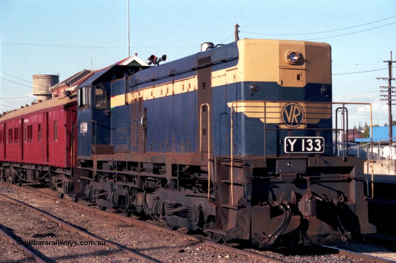 144-10
Wangaratta, VR liveried broad gauge Y class Y 133 Clyde Engineering EMD model G6B serial 65-399 on the up Wahgunyah 'Stringybark Express' mixed with BCPL type bogie passenger carriage BCPL 29.
Keywords: Y-class;Y133;Clyde-Engineering-Granville-NSW;EMD;G6B;65-399;