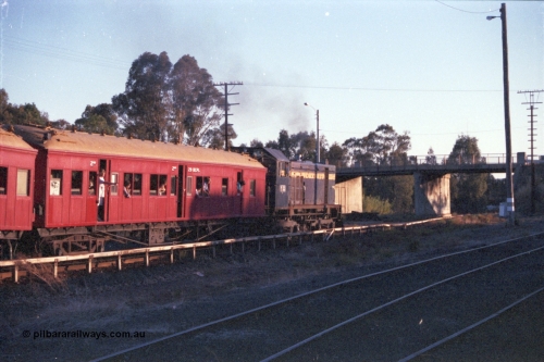 144-15
Wangaratta, VR liveried broad gauge Y class Y 133 Clyde Engineering EMD model G6B serial 65-399 leads the Wahgunyah 'Stringybark Express' mixed special with BCPL type bogie passenger carriage BCPL 29 in the consist, south bound for Benalla and about to head under the Roy St over bridge, trailing view.
Keywords: Y-class;Y133;Clyde-Engineering-Granville-NSW;EMD;G6B;65-399;