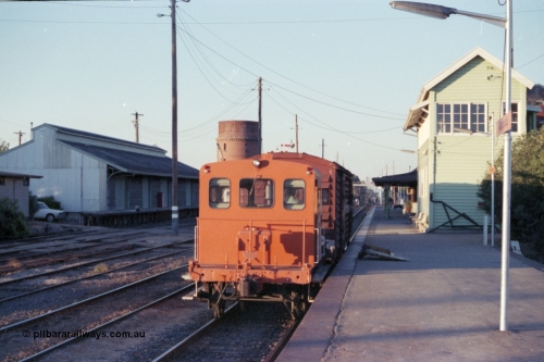 144-17
Wangaratta station platform view, goods shed at left, broad gauge V/Line RT class rail tractor RT 5, now with the Wahgunyah mixed departed has shunted VLBY type bogie louvre van VLBY 148 into the platform or No. 1 Rd, next to the elevated signal box are the automatic staff exchanger set up gauge. RT 5 built new by Newport Workshops September 1957. The VLBY which is the Wangaratta parcels waggon started out being built by Newport Workshops October 1956 as VP type VP 148, in May 1979 re-coded to VLPY, re-coded again in 1982 to VLBY.
Keywords: RT-class;RT5;Victorian-Railways-Newport-WS;VLBY-type;VLBY148;VP-type;VLPY-type;