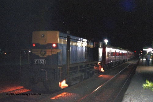 144-22
Euroa station platform view, broad gauge VR liveried Y class Y 133 Clyde Engineering EMD model G6B serial 65-399 with the up Wahgunyah 'Stringybark Express' mixed sits in No. 2 Rd awaiting a cross, night time exposure.
Keywords: Y-class;Y133;Clyde-Engineering-Granville-NSW;EMD;G6B;65-399;