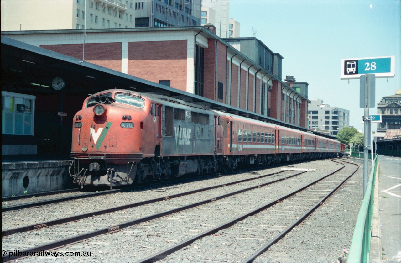 145-04
Spencer Street Station dual gauge Platform Number 1, broad gauge V/Line A class A 70 Clyde Engineering EMD model AAT22C-2R serial 84-1187 rebuilt from B 70 Clyde Engineering EMD model ML2 serial ML2-11 with double N set.
Keywords: A-class;A70;Clyde-Engineering-Rosewater-SA;EMD;AAT22C-2R;84-1187;rebuild;bulldog;