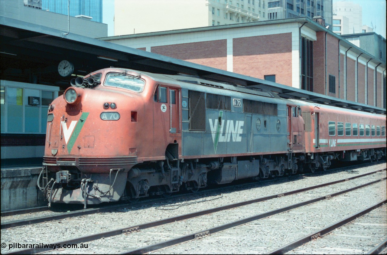 145-05
Spencer Street Station dual gauge Platform Number 1, broad gauge V/Line A class A 70 Clyde Engineering EMD model AAT22C-2R serial 84-1187 rebuilt from B 70 Clyde Engineering EMD model ML2 serial ML2-11.
Keywords: A-class;A70;Clyde-Engineering-Rosewater-SA;EMD;AAT22C-2R;84-1187;rebuild;bulldog;