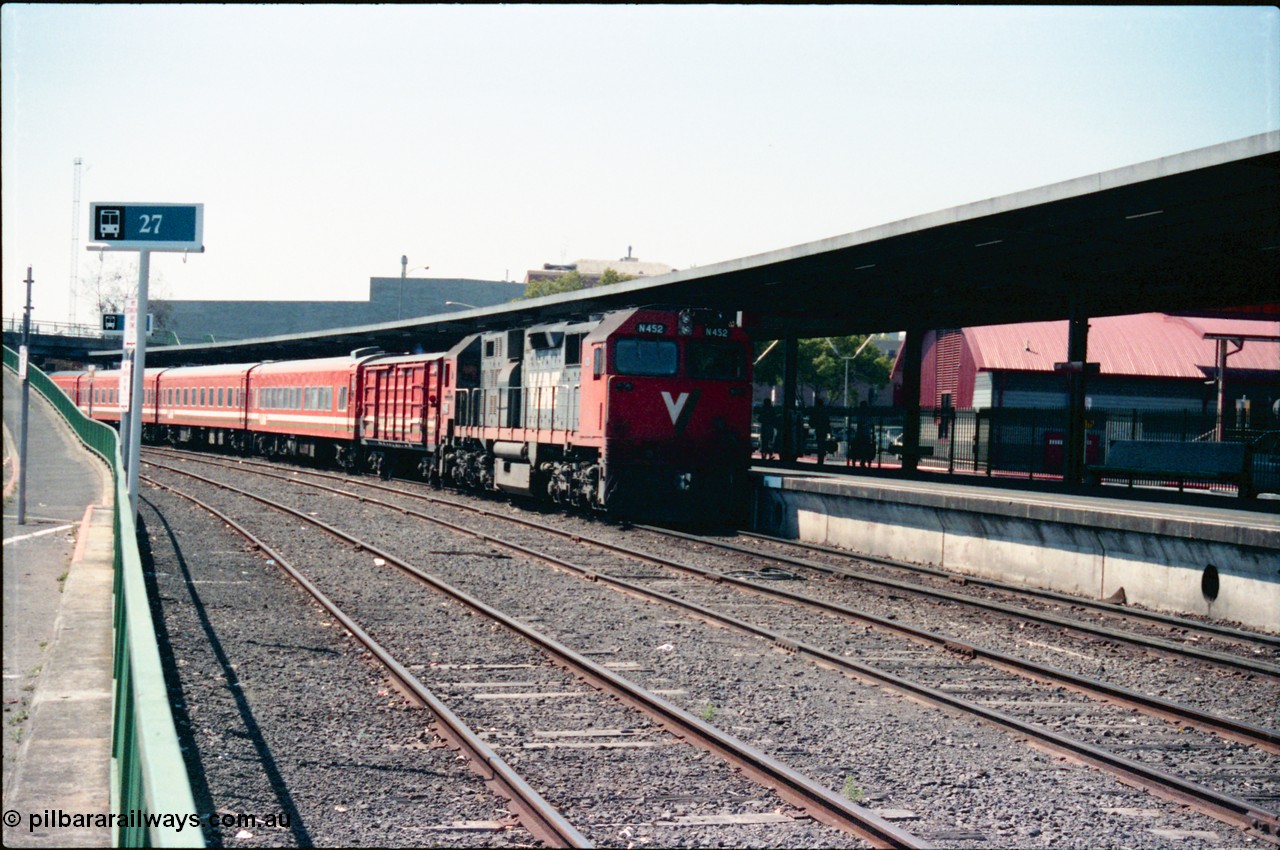 145-11
Spencer Street Station dual gauge Platform Number 1, broad gauge V/Line N class N 452 'Rural City of Wodonga' Clyde Engineering EMD model JT22HC-2 serial 85-1220 arrives with a 5 car N set.
Keywords: N-class;N452;Clyde-Engineering-Somerton-Victoria;EMD;JT22HC-2;85-1220;