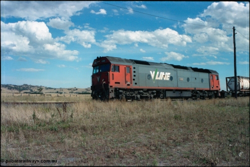 145-18
Wallan Loop, north end, standard gauge V/Line G class G 521 Clyde Engineering EMD model JT26C-2SS serial 85-1234 leads a north bound down goods through near Boundary Rd.
Keywords: G-class;G521;Clyde-Engineering-Rosewater-SA;EMD;JT26C-2SS;85-1234;