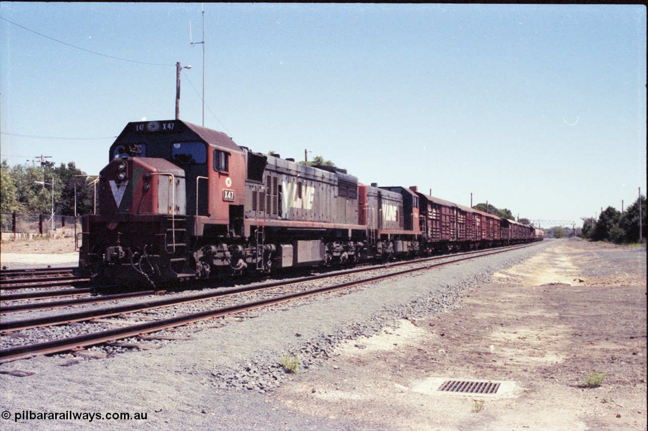 146-06
Seymour, rationalised broad gauge yard view with stabled Wodonga goods train 9303, behind V/Line X class X 47 Clyde Engineering EMD model G26C serial 75-794 and T class T 409 Clyde Engineering EMD model G18B serial 68-625.
Keywords: X-class;X47;Clyde-Engineering-Rosewater-SA;EMD;G26C;75-794;