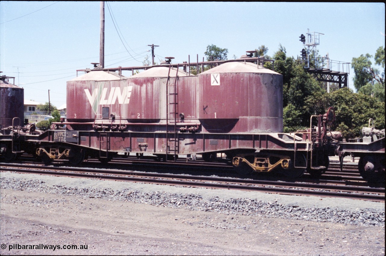 146-11
Seymour, rationalised broad gauge yard, V/Line VPCX type bogie pneumatic three cell cement hopper VPCX 77. Built new as JX type September 1976 at Newport Workshops, recoded to VPCX in June 1979.
Keywords: VPCX-type;VPCX77;JX-type;