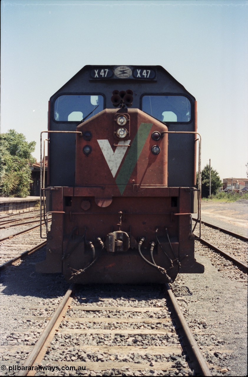 146-12
Seymour, rationalised broad gauge yard view with stabled Wodonga goods 9303 behind V/Line X class X 47 Clyde Engineering EMD model G26C serial 75-794, cab front.
Keywords: X-class;X47;Clyde-Engineering-Rosewater-SA;EMD;G26C;75-794;