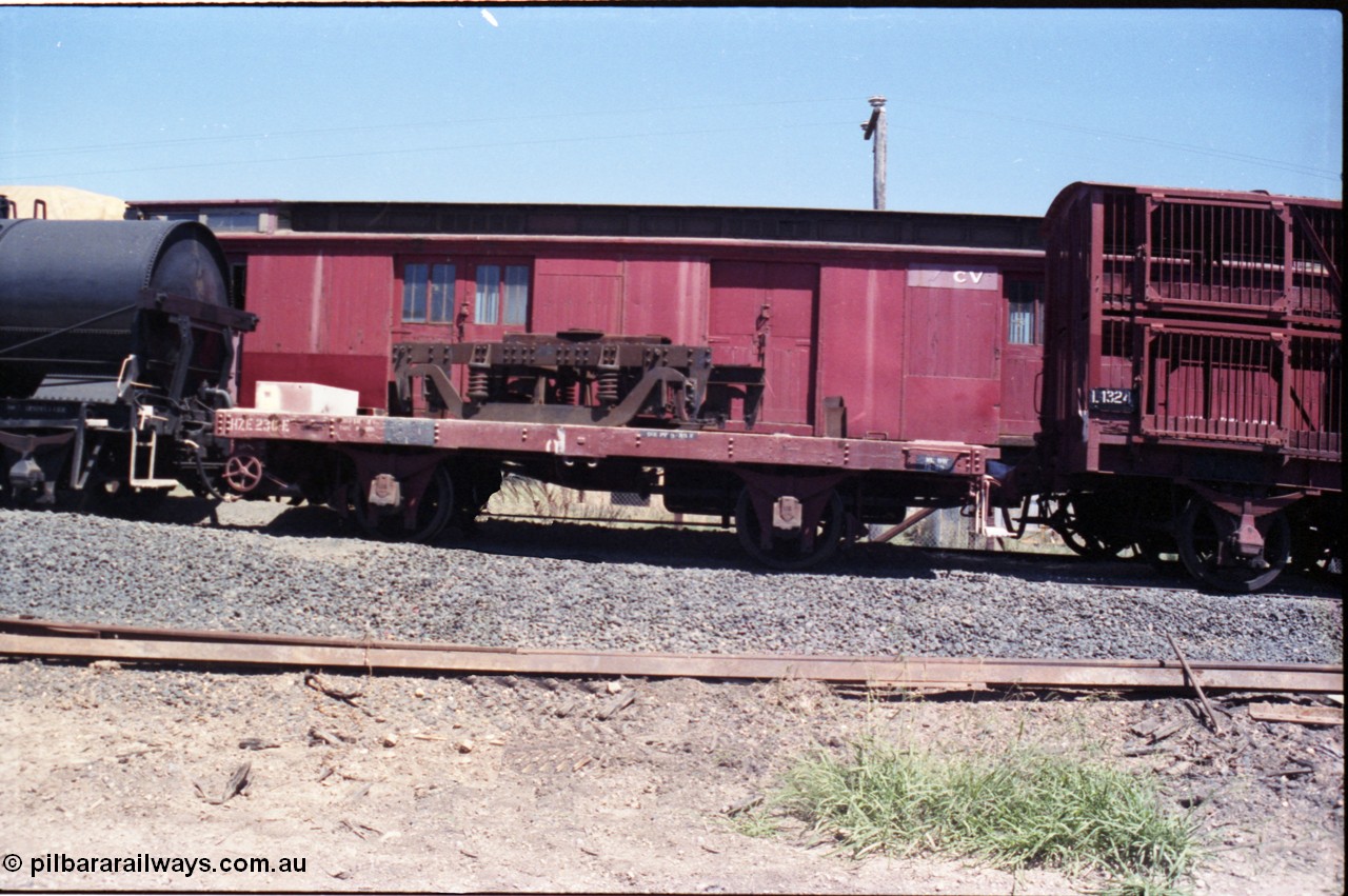 146-17
Seymour, preserved broad gauge Victorian Railways HZE type four wheel loco engine transport waggon HZE 230 recoded from HR 12 (2nd), side view. Interesting history for this waggon, built in 1928 at Newport Workshops as an IZ type IZ 147, February 1965 recoded RY, then June 1969 to KQ type KQ 7, August 1978 recoded to K type K 1, then September 1990 to HR type HR 12 (2nd), then finally July 1986 to HZE type HZE 230. 
Keywords: HZE-type;HZE230;HR-type;HR12;IZ-type;IZ147;RY-type;KQ-type;KQ7;K-type;K1;