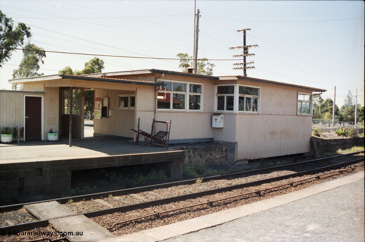 146-25
Broadford station building looking from the up platform, show original signal box opening in platform facing, and new box on the right.
