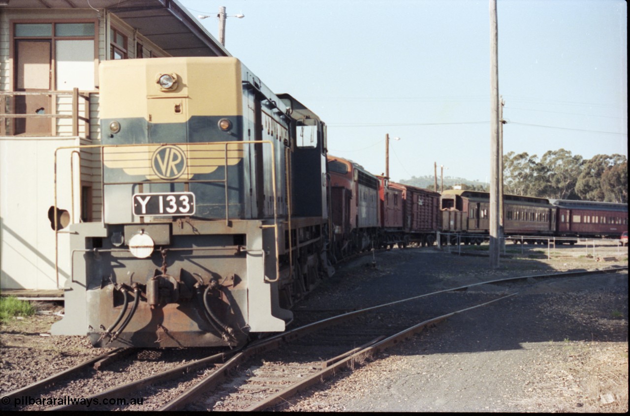 147-13
Seymour VR liveried Y class Y 133 Clyde Engineering EMD model G6B serial 65-399 shunts SRHC rollingstock behind the now derelict Seymour B Signal Box towards the loco depot, Y 133 shows signs of work to the pilot.
Keywords: Y-class;Y133;Clyde-Engineering-Granville-NSW;EMD;G6B;65-399;