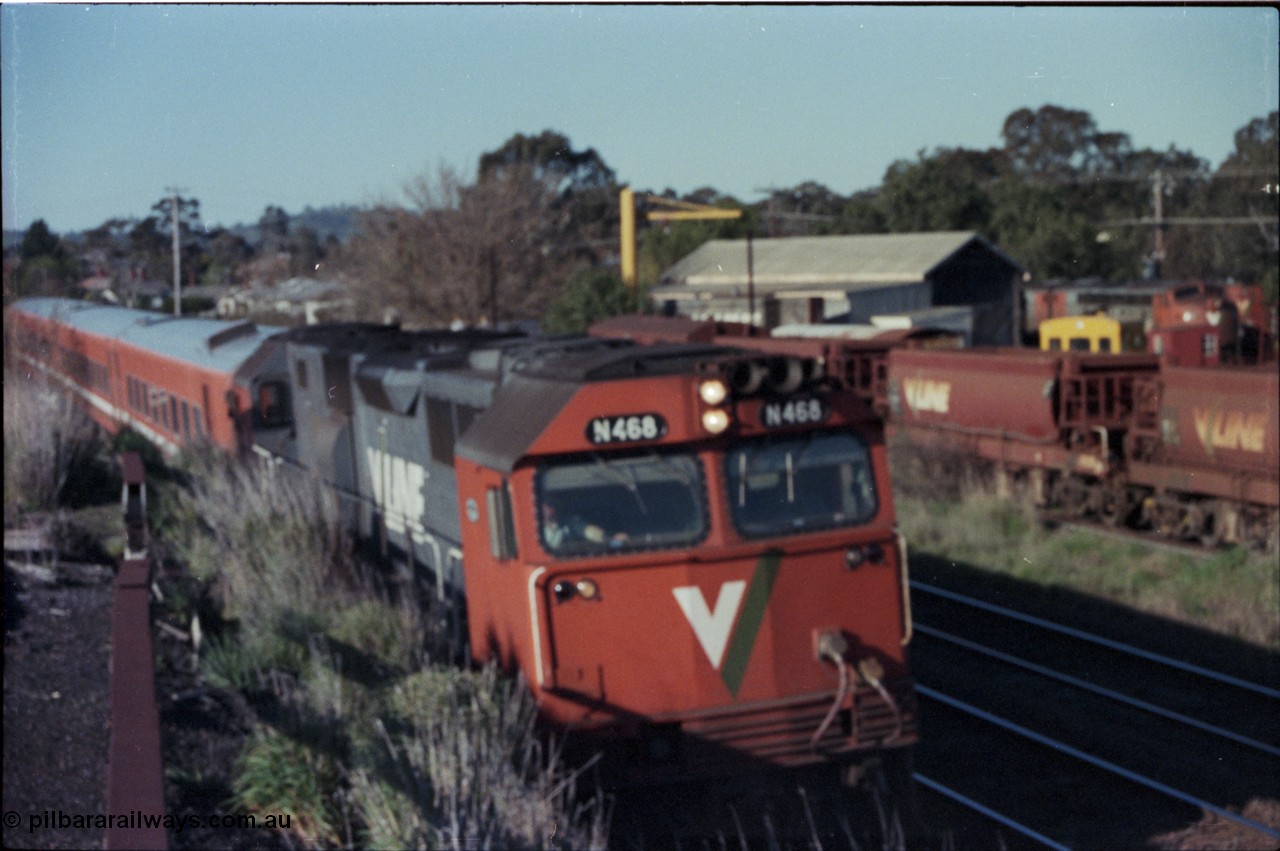 147-18
Seymour, a very rushed shot of V/Line broad gauge N class N 468 'City of Bairnsdale' Clyde Engineering EMD model JT22HC-2 serial 86-1197 with the up afternoon Cobram pass? Taken from Siding A looking back towards the loco depot. Out of focus.
Keywords: N-class;N468;Clyde-Engineering-Somerton-Victoria;EMD;JT22HC-2;86-1197;