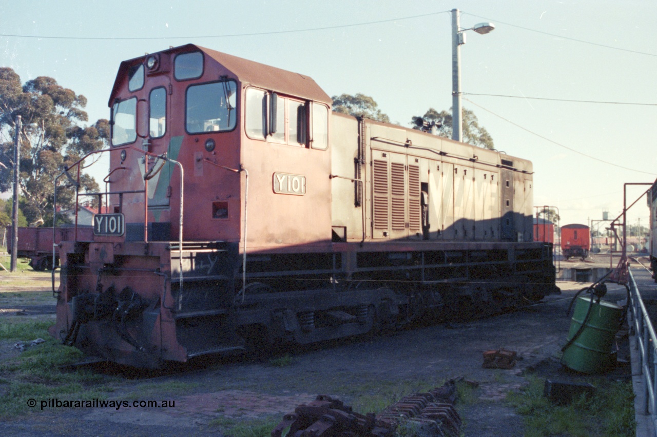 147-22
Seymour loco depot, standard gauge V/Line shunt loco Clyde Engineering built EMD model G6B serial 63-291 and class leader for the Y class Y 101 sits on the standard gauge turntable road, these units ride on former 'Swing Door' motor bogies.
Keywords: Y-class;Y101;Clyde-Engineering-Granville-NSW;EMD;G6B;63-291;