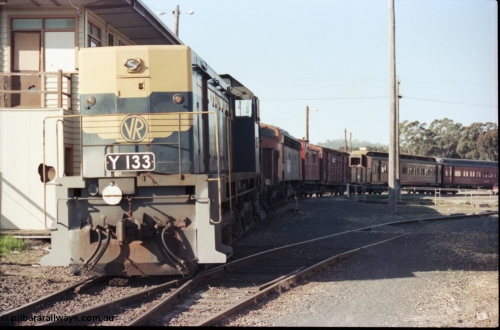 147-13
Seymour VR liveried Y class Y 133 Clyde Engineering EMD model G6B serial 65-399 shunts SRHC rollingstock behind the now derelict Seymour B Signal Box towards the loco depot, Y 133 shows signs of work to the pilot.
Keywords: Y-class;Y133;Clyde-Engineering-Granville-NSW;EMD;G6B;65-399;