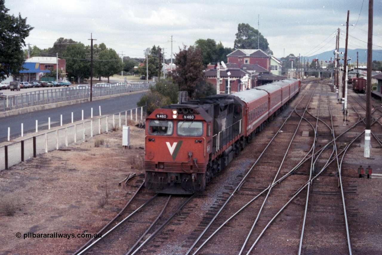 148-08
Wangaratta yard view with V/Line broad gauge N class N 460 'City of Castlemaine' Clyde Engineering EMD model JT22HC-2 serial 85-1228 with N set on down Albury passenger departing the station.
Keywords: N-class;N460;Clyde-Engineering-Somerton-Victoria;EMD;JT22HC-2;85-1228;