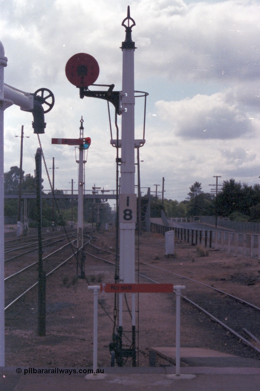 148-18
Wangaratta, Signal Post 18 at the end of the platform, Single Disc Signal from Siding 'A' to Main Line, beyond that is semaphore Signal Post 20 Down Home from No.1 Road to Main Line to Post 24, and water stand pipe at left.
