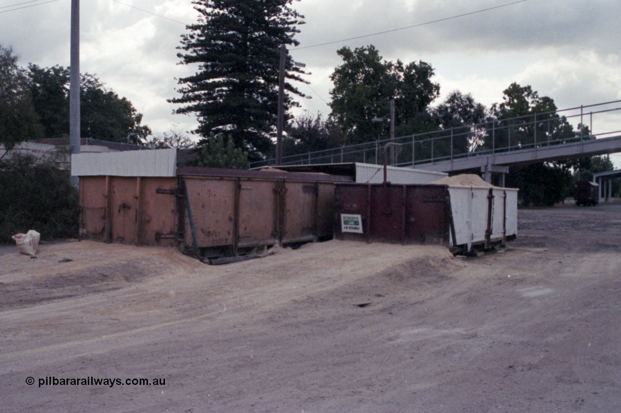 148-22
Wangaratta, ex VR waggons GY type GY 2125 and G 4113 used for lime and sand storage by the local super phosphate agent McDonald. GY 2125 was built new by Newport Workshops June 1944, around 1990 was removed from the register. G 4113 was originally built new February 1952 by Metro Cammel C&W Co, England, recoded to G in 1982, off register 1990.
Keywords: GY-type;GY2125;G-type;G4113;