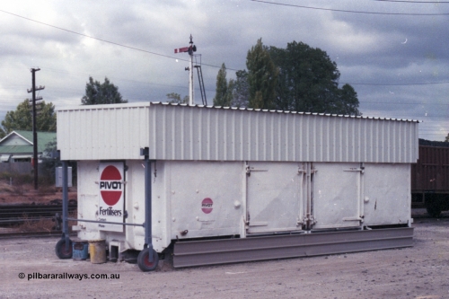 148-28
Wangaratta, ex VR waggon G type G 16113 grounded for use as super phosphate storage by the local agent McDonald's. This G class started out as HY type HY 16113 built new July 1949, recoded to GY in 1962, then G in 1982. Off register 1986. With Signal Post 12 visible over the top of waggon.
Keywords: G-type;GY-type;Victorian-Railways-Newport-WS;HY-type;G16113;
