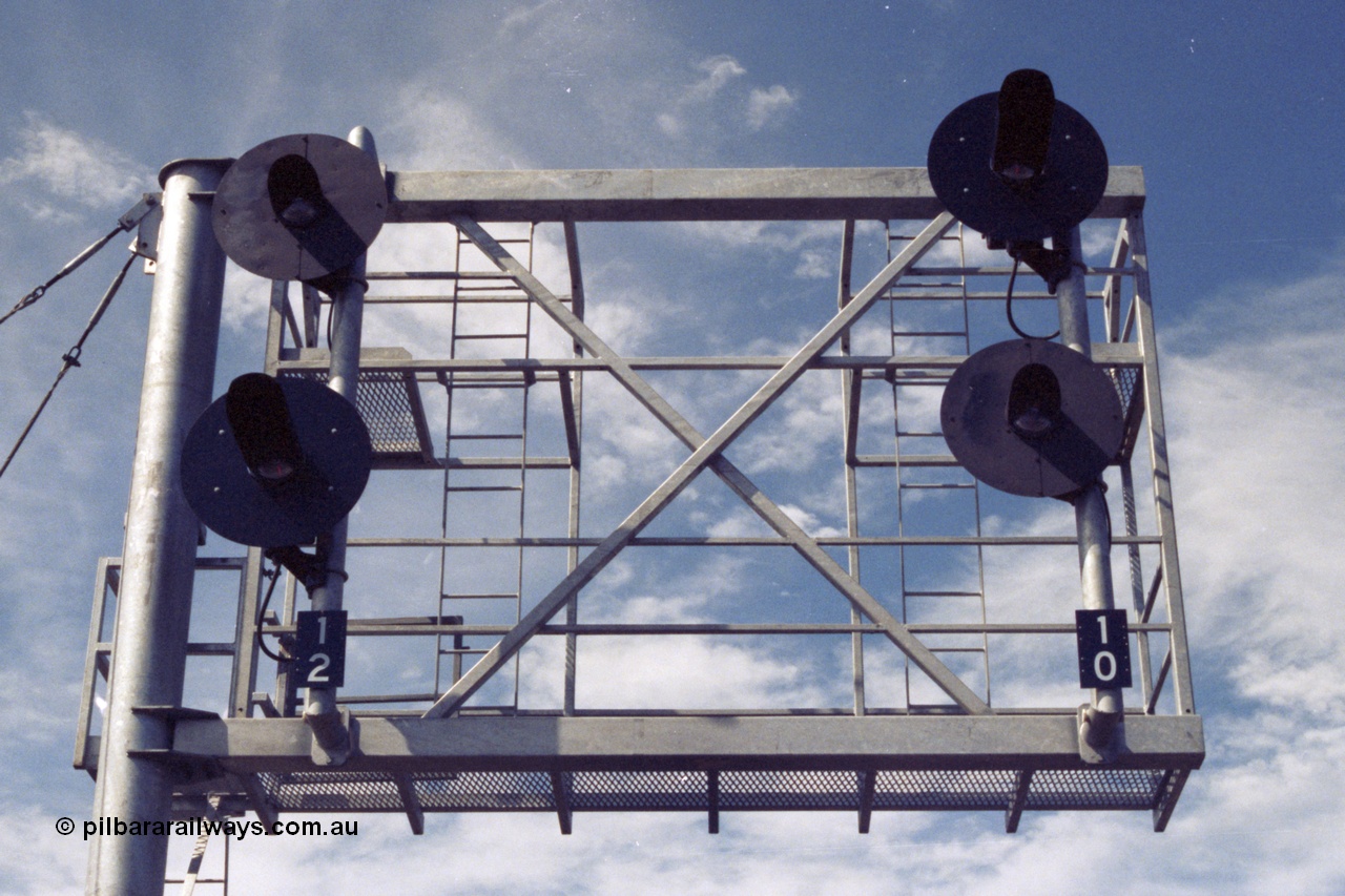 149-06
Rockbank, view of cantilevered signal post with searchlight signals 12 (No. 2 Road) and 10 (No. 1 Road) Up Home Signals.
