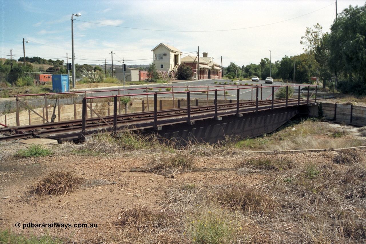 149-08
Bacchus Marsh manual turntable overview, new sealed car park, signal box and station building.

