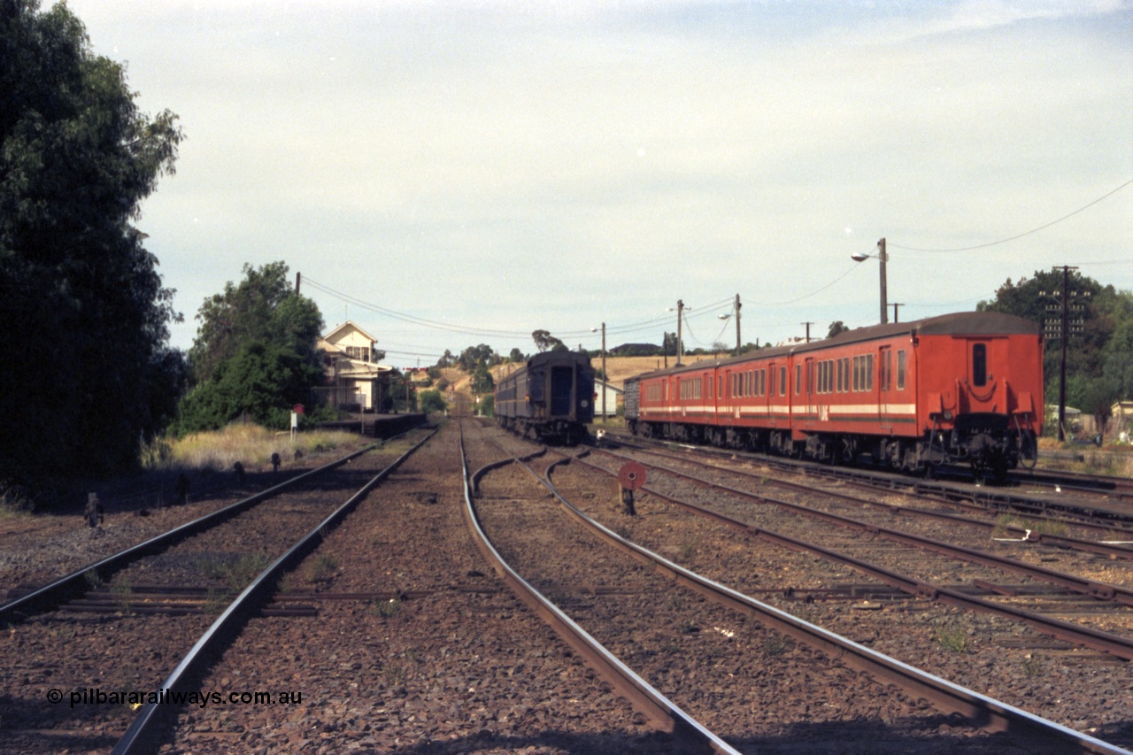 149-19
Bacchus Marsh station yard overview with stabled passenger sets looking down mainline towards Melbourne.
