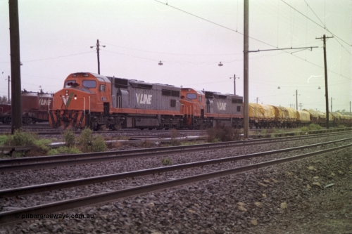 150-01
Tottenham yard, V/Line broad gauge C class locos C 506 Clyde Engineering EMD model GT26C serial 76-829 and C 510 serial 76-833 prepare their Adelaide bound goods train 9169 in rain as departure time approaches.
Keywords: C-class;C506;Clyde-Engineering-Rosewater-SA;EMD;GT26C;76-829;