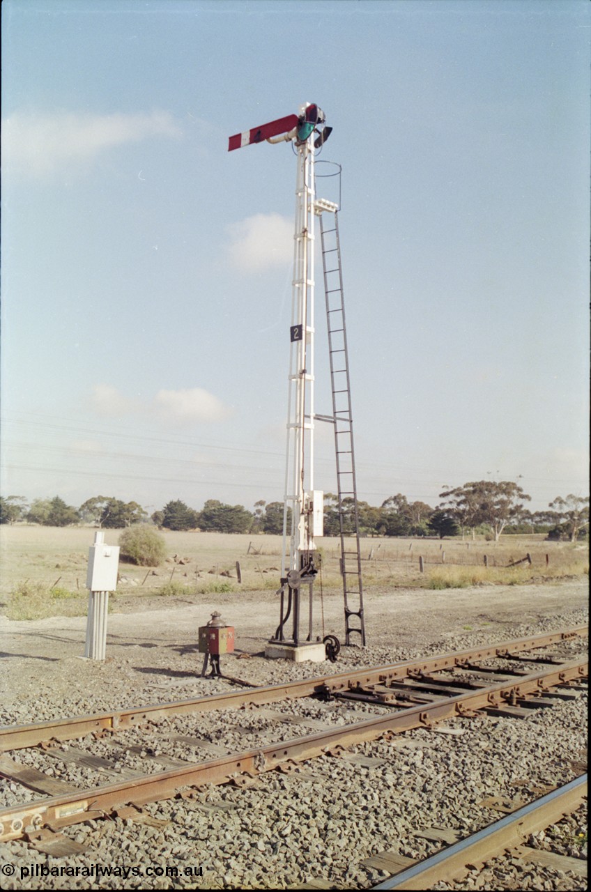 151-01
Gheringhap, semaphore signal post two, down home for No.1 Road to post four, points and indicator are for Siding A to either Sidings B or No.1 Road, mainline at foot of image.
