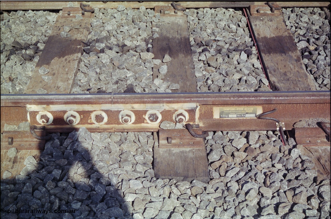 151-02
Gheringhap, insulated rail joint in mainline at site of points for Siding A extension to a loop, near down distant and Butchers Road grade crossing.
