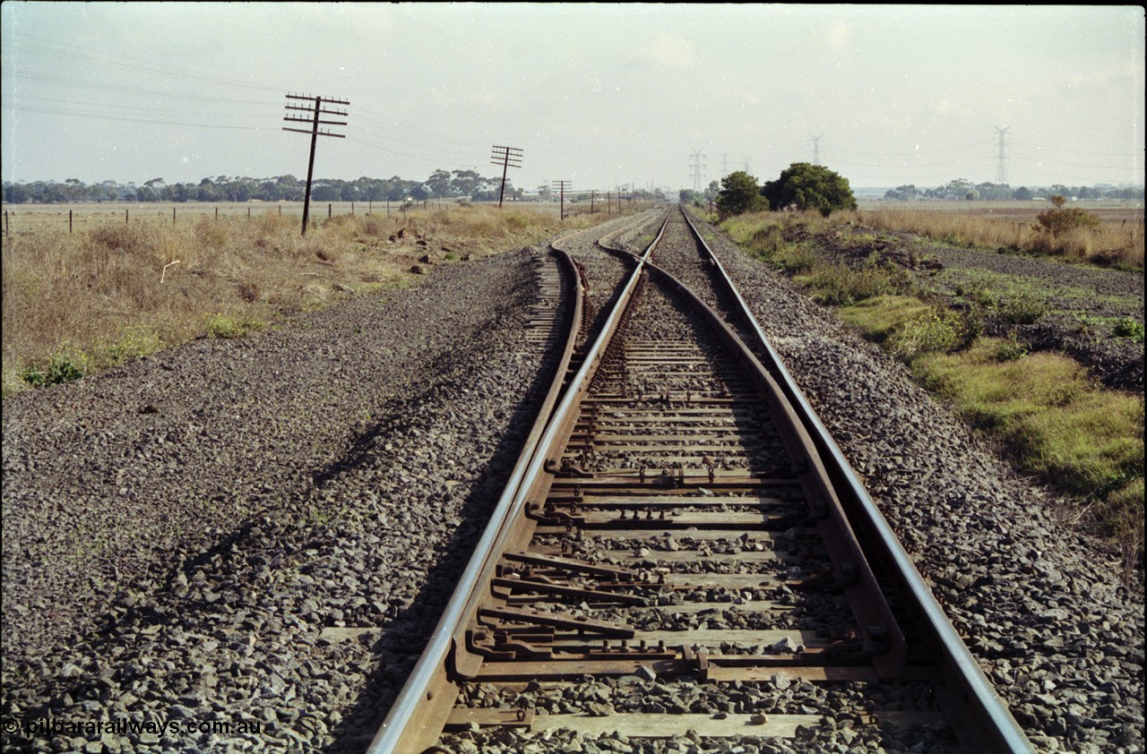 151-03
Gheringhap, view from Geelong end of newly extended A Siding into a loop road, looking toward Gheringhap, points spiked for straight.
