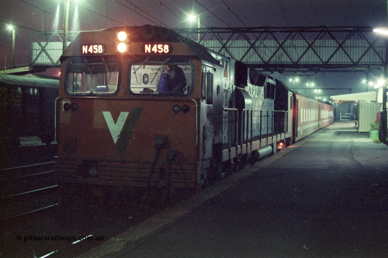 151-18
Traralgon station platform, V/Line broad gauge N class N 458 'City of Maryborough' Clyde Engineering EMD model JT22HC-2 serial 85-1226 and N set await departure with 8406 up passenger train.
Keywords: N-class;N458;Clyde-Engineering-Somerton-Victoria;EMD;JT22HC-2;85-1226;